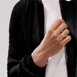 Silver tungsten carbide ring with polished yellow gold sides, 8mm wide, from T.M.J, showcasing a sleek, modern design.