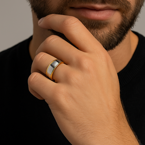 Silver tungsten carbide ring with yellow gold polished sides, 8mm width, from T.M.J, featuring a sleek and modern design.