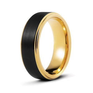 Black and gold tungsten ring called "The Ferrari" by T.M.J, featuring a sleek design with polished finish.