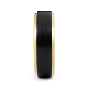 T.M.J tungsten ring called "The Ferrari" featuring black and gold detailing, showcasing a sleek, polished design.