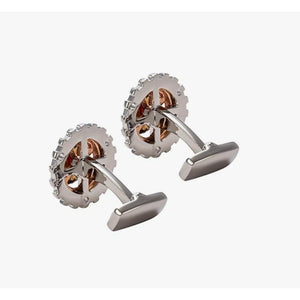 Silver T.M.J rotatable bicycle gear cufflinks featuring mechanical watch movement design for men.