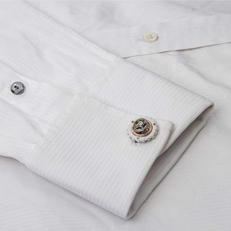 Silver T.M.J rotatable bicycle gear cufflinks featuring mechanical watch movement design for men, with intricate watch gear details.