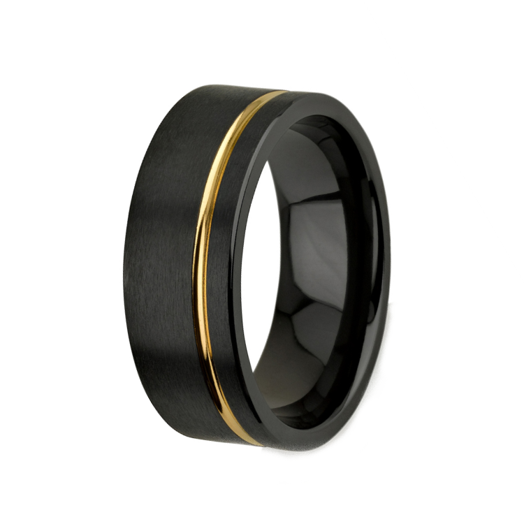 Black and gold zirconium ring called The Rebal with sleek design, featuring zirconium material and T.M.J branding.