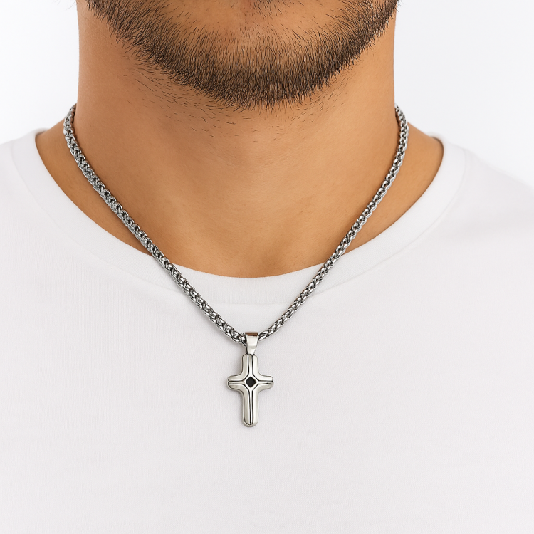 Small stainless steel cross pendant with satin inlay, crafted by TMJ, featuring a sleek and polished religious jewelry design.