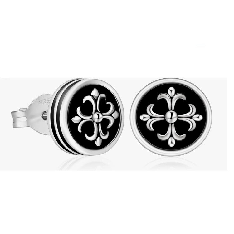 Men’s black onyx stud earrings with cross and fleur-de-lis center by TMJ, showcasing polished black stones and detailed metal design.