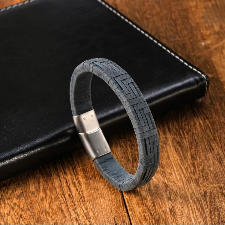 Brown genuine leather bracelet with a braided design and stainless steel clasp, by TMJ, styled for casual wear.