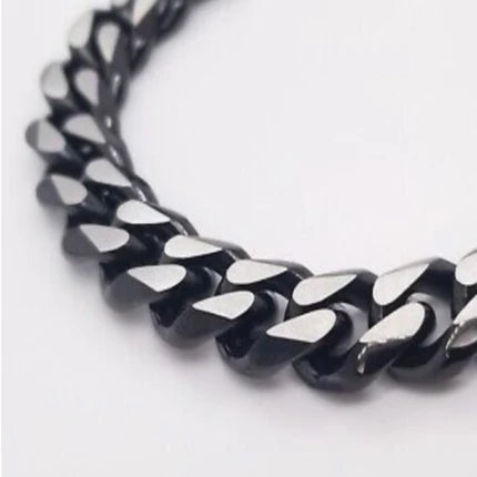 Matte black and stainless steel two-tone Cuban link chain necklace by TMJ, 50cm long, with bold interlocking links.