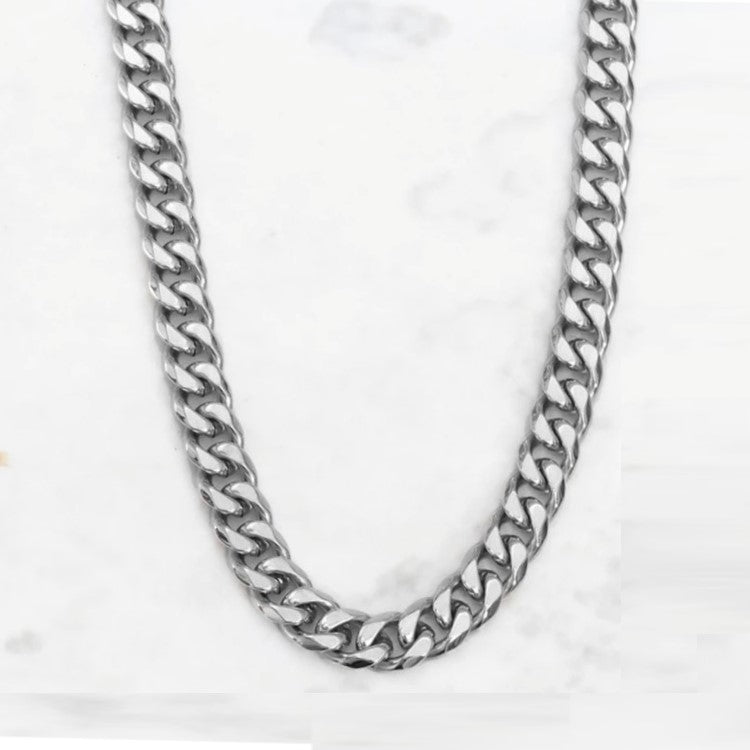 Stainless steel men's Cuban chain necklace, 8mm thick, with a sleek design, from TMJ, displayed on a plain background