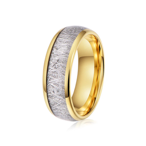 Elegant tungsten carbide ring with silver leaf meteorite inlay, designed by TMJ, showcasing intricate craftsmanship and unique material contrast.