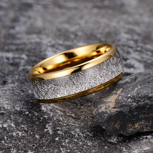 Elegant tungsten carbide ring by TMJ featuring a silver leaf meteorite inlay and polished finish.