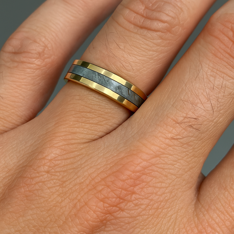 TMJ zirconium rings featuring Gibeon meteorite and 18k gold wedding band with dual bands, showcasing polished metal and textured meteorite surface.