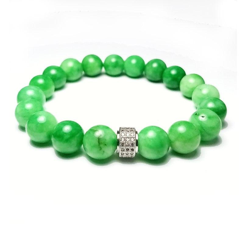 Green Jadeite beaded bracelet by T.M.J featuring 6mm round beads on a 17cm stretch bracelet.