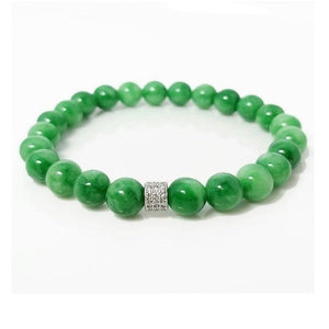 Green Jadeite beaded bracelet by T.M.J with 6mm round beads, 17cm length, showcasing smooth, polished jadeite stones.