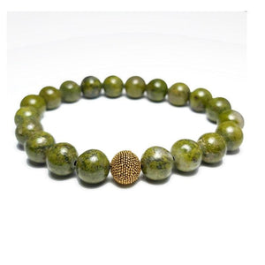 Green Lapis beaded bracelet from T.M.J, 17cm, 6mm round beads, natural stone jewelry with vibrant green color.