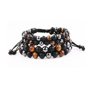 Double beaded bracelet featuring tiger eye, matte agate, and hematite beads from T.M.J, showcasing natural earthy tones.