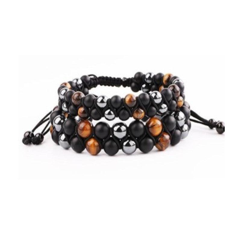 Double beaded bracelet featuring tiger eye, matte agate, and hematite beads from T.M.J, showcasing natural earthy tones.