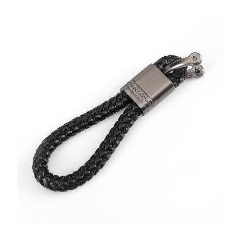 Black woven leather key-chain with detachable metal key rings by T.M.J, featuring a stylish and practical key-ring accessory.