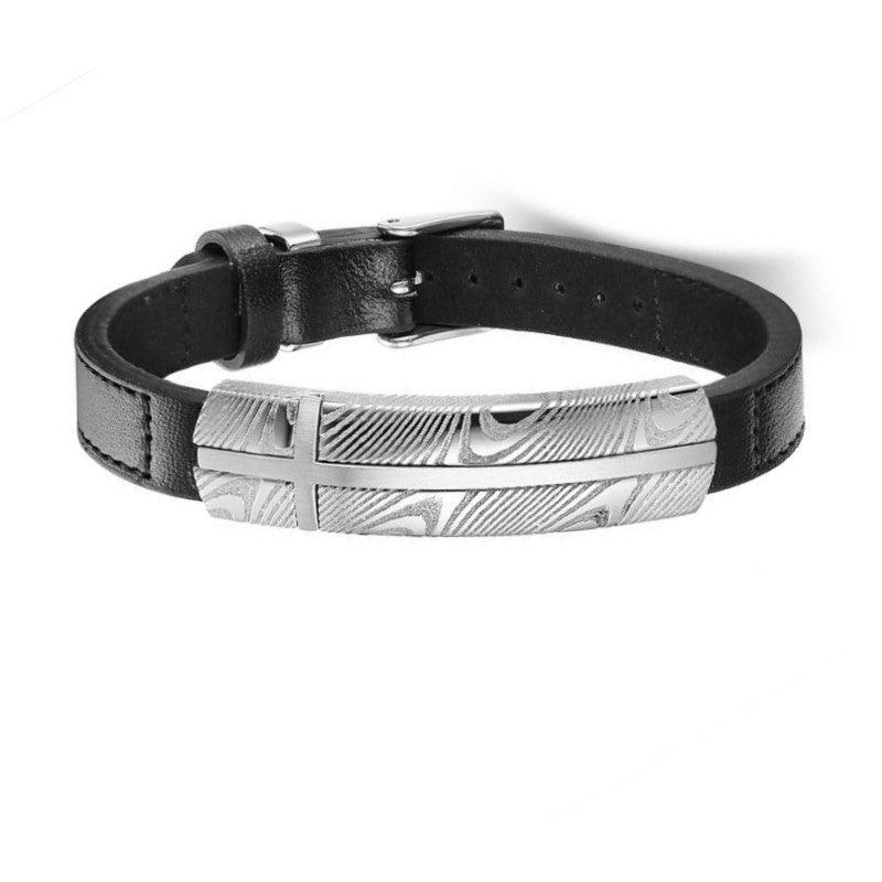 Damascus steel and black leather bracelet from T.M.J, featuring a sleek design with braided leather and stainless steel accents.