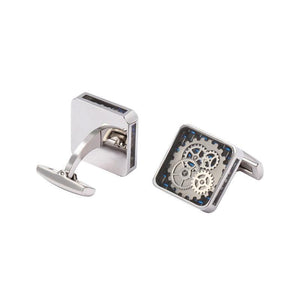 T.M.J mechanical cufflinks featuring stainless steel design with a sleek carbon fiber background.