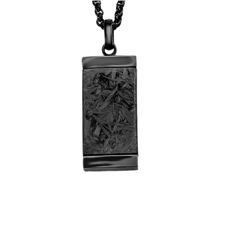 Forged carbon graphite pendant in black stainless steel, T.M.J pendant with sleek, modern design and polished finish.