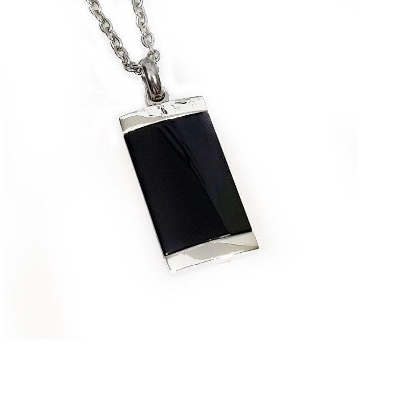 Stainless steel black onyx pendant with matching chain necklace by T.M.J, featuring a sleek black onyx stone and polished metal finish.