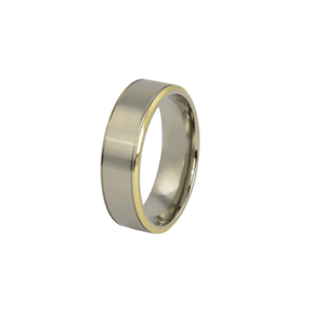 Titanium ring with gold edge and satin finish top, crafted by T.M.J, showcasing a sleek and elegant design.