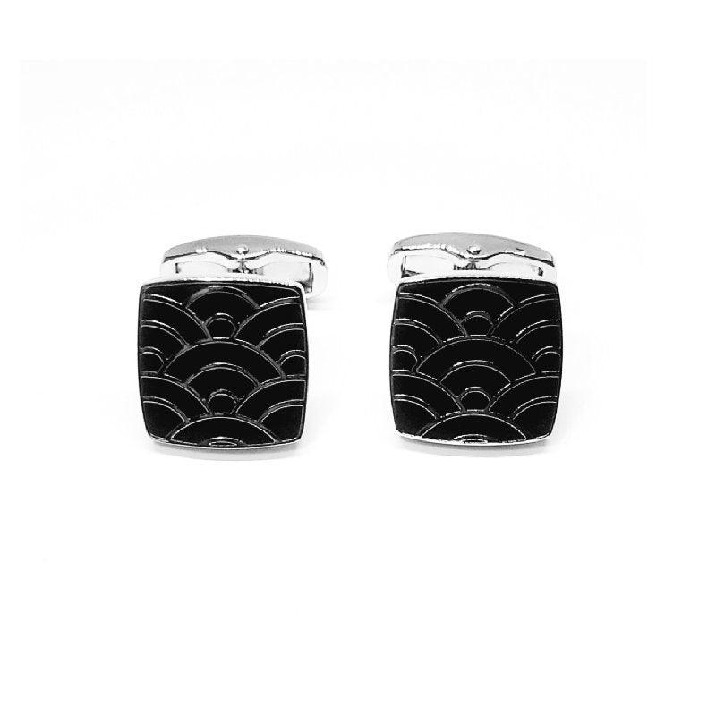 Rhodium Plated Black Cloisonne Enamel Square CufflinksThese striking Rhodium-plated enamel cufflinks feature a stunning Cloisonné design with contrasting black enamel and silver running throughout the cufflink face. TheEnamel cufflinksT.M.JTheodore Men's JewelryRhodium Plated Black Cloisonne