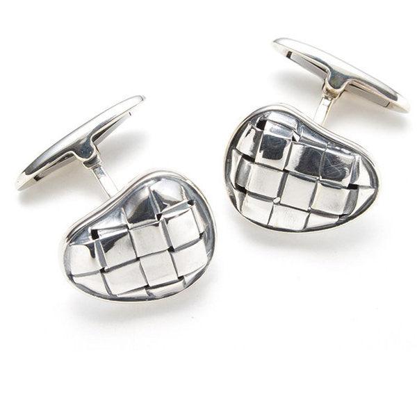 Sterling silver cufflinks for men from Theodore Men's Jewellery featuring a unique, polished design for elegant formal wear.