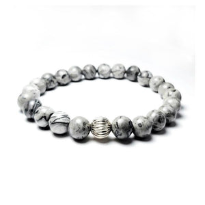 Natural Gray Jasper Beads BraceletDESCRIPTION
 Traditionally it is used to bring serenity and unity. They say this type of Jasper is a supreme protector. It reminds us to help each other. Placed undeBead BraceletsT.M.JTheodore Men's JewelryNatural Gray Jasper