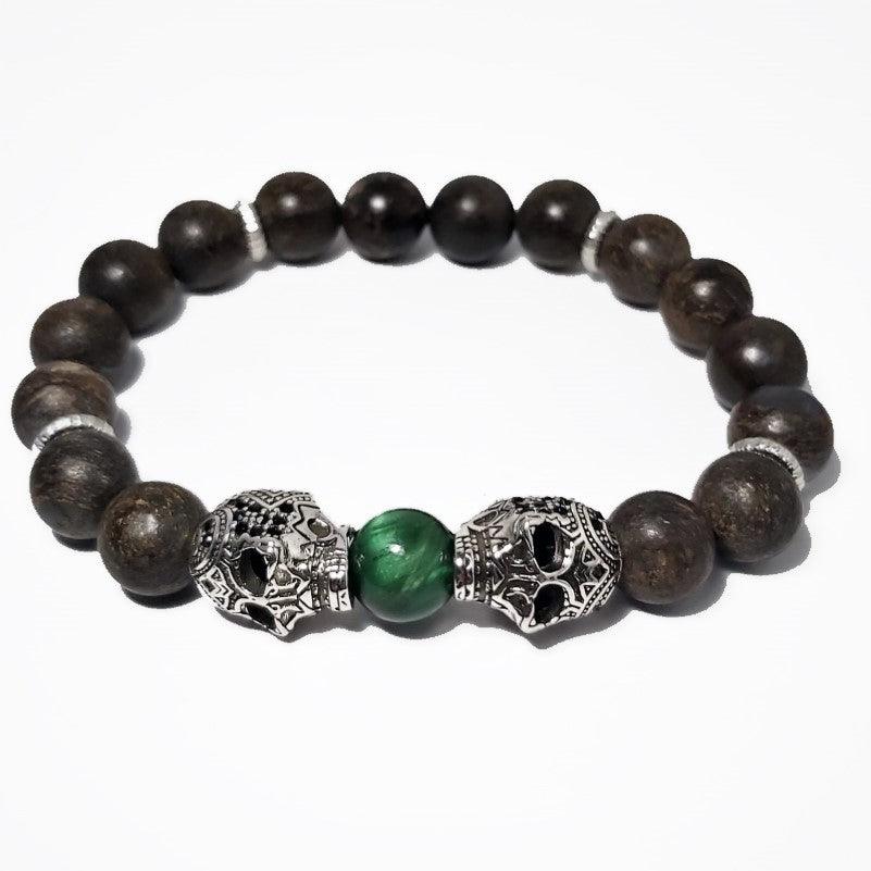 10mm Natural Bronzite Stone and Two Skull Bead BraceletDESCRIPTION
 This stone has powerful metaphysical properties that will help to shield you against negativity. The energy of these stones may stimulate the gift of prBead BraceletsT.M.JTheodore Men's Jewelry10mm Bronzite Stone